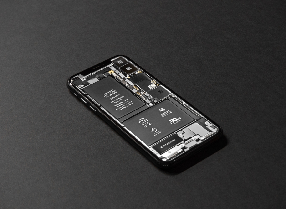 iPhone X innards with batteries showing