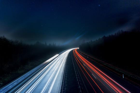 Long exposure photo of car lights on a highway at night
